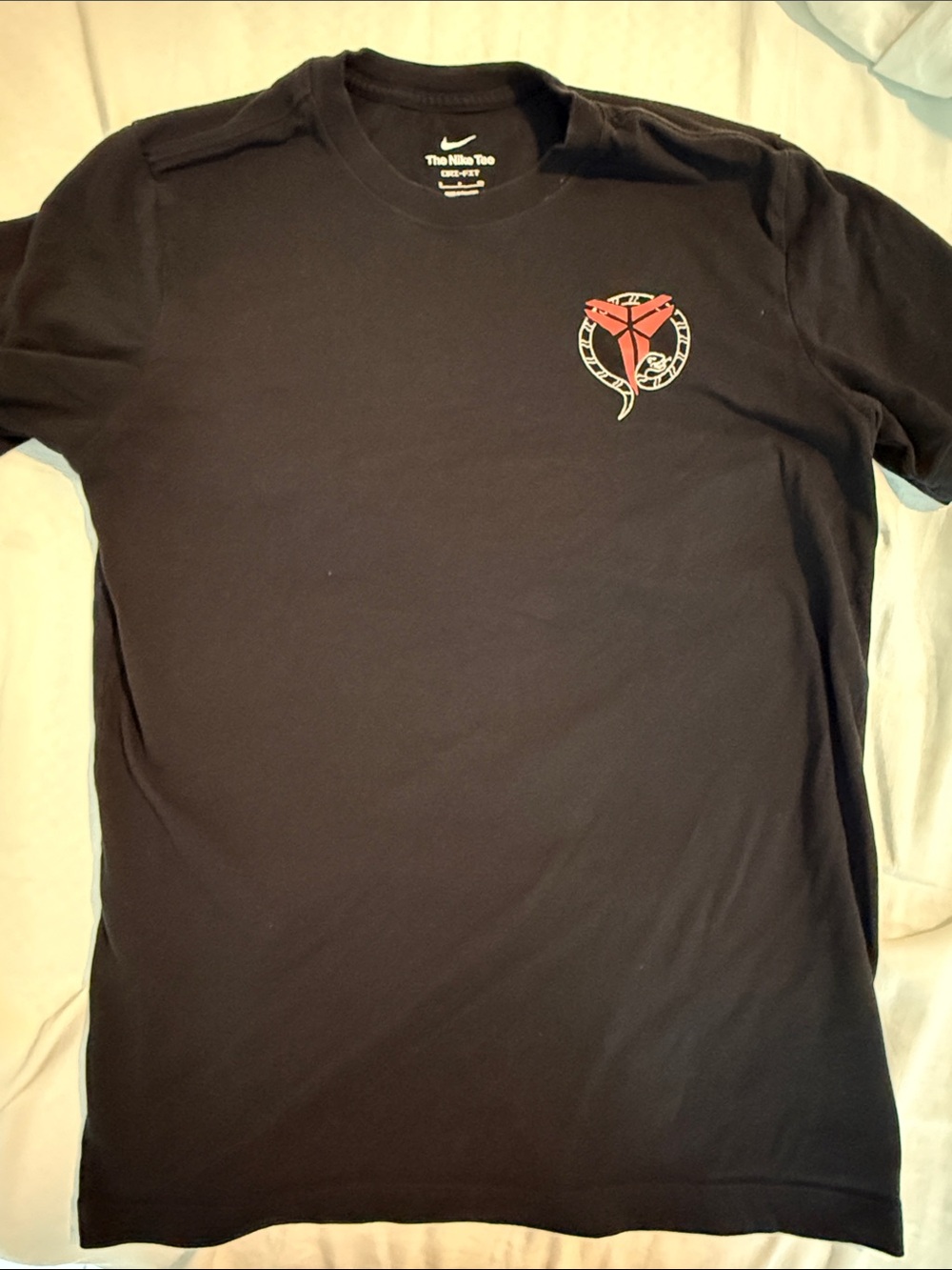Nike Black Short-Sleeve Tee with Small Red & White Chest Graphic